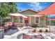 Inviting home exterior with a cozy patio setup, perfect for outdoor relaxation and entertaining at 1489 18Th St, Sarasota, FL 34234