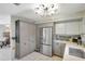 Updated kitchen with stainless steel appliances, sleek countertops, and ample cabinet space at 1489 18Th St, Sarasota, FL 34234