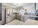 Modern kitchen featuring stainless steel appliances, sleek countertops, and plenty of storage at 1489 18Th St, Sarasota, FL 34234