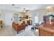 Open living room with comfortable seating, modern lighting, and access to outdoor space at 1489 18Th St, Sarasota, FL 34234