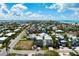 Aerial view of a residential neighborhood, showing the proximity of the home to the beach and community amenities at 215 65Th St, Holmes Beach, FL 34217
