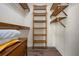 Inside the closet is a storage system of shelves and drawers at 215 65Th St, Holmes Beach, FL 34217