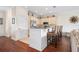 Eat-in kitchen features stainless steel appliances, granite countertops, and seating for three at 215 65Th St, Holmes Beach, FL 34217