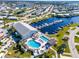 Scenic aerial view of community amenities, including a marina, swimming pools, and lush landscaping at 237 Blackburn Blvd, North Port, FL 34287