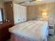 Cozy bedroom featuring a large bed and ample closet space at 237 Blackburn Blvd, North Port, FL 34287