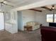 Comfortable living room with a sofa and side tables for relaxation at 237 Blackburn Blvd, North Port, FL 34287