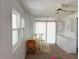 Bright living room featuring large windows and a neutral color palette at 237 Blackburn Blvd, North Port, FL 34287