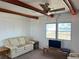 Cozy living room with a TV and ample seating for entertainment at 237 Blackburn Blvd, North Port, FL 34287