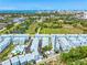 Aerial view of a townhome community close to downtown and the bay, with easy access to both urban amenities and waterfront at 2408 Ezzell Ct, Sarasota, FL 34237