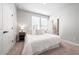 Inviting bedroom with plush carpet, ensuite bath and plenty of natural light at 2408 Ezzell Ct, Sarasota, FL 34237
