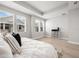 Spacious main bedroom with ample natural light and tray ceiling at 2408 Ezzell Ct, Sarasota, FL 34237