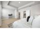 Large main bedroom with ample natural light, and ensuite bath at 2408 Ezzell Ct, Sarasota, FL 34237