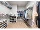 Spacious walk-in closet with custom shelving and ample storage space at 2408 Ezzell Ct, Sarasota, FL 34237