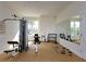 Well-equipped workout room with modern machines, free weights, and a full-length mirror at 2496 Farms Ct, Sarasota, FL 34240
