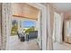 Charming balcony with comfortable seating and stunning ocean views at 26 Sandy Hook S Rd, Sarasota, FL 34242