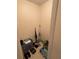Storage room with cleaning and household supplies on tile flooring at 2624 Hidden Lake Dr N # C, Sarasota, FL 34237