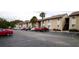 Apartment building featuring ample parking, and close proximity to trees, grass, and shade at 2733 Hidden Lake Blvd # A, Sarasota, FL 34237