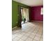 Bright living room featuring tile floors, modern paint, and a sliding glass door at 2733 Hidden Lake Blvd # A, Sarasota, FL 34237