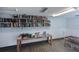 Cozy library room featuring shelves packed with books and tables displaying puzzles and games at 2901 26Th W St # 312, Bradenton, FL 34205