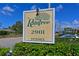 Entrance sign for Raintree community with address number in decorative green lettering at 2901 26Th W St # 312, Bradenton, FL 34205