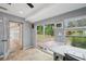 Home office offers sliding glass doors to the backyard at 3006 Wister Cir, Valrico, FL 33596