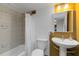 Bathroom with tiled shower and pedestal sink at 33 S Gulfstream Ave # 502, Sarasota, FL 34236