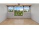 Bedroom features tile floors and large windows with outdoor views at 33 S Gulfstream Ave # 502, Sarasota, FL 34236