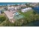 Picture of the condo community with its amenities and located right on the water on a sunny day at 3320 Gulf Of Mexico Dr # 307C, Longboat Key, FL 34228