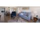 Living room showcasing stylish sofas, unique coffee table, and an open floor plan at 3320 Gulf Of Mexico Dr # 307C, Longboat Key, FL 34228