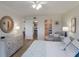 Comfortable main bedroom features stylish decor, wood floors, and closet with an attached bathroom, offering a private retreat at 3320 Gulf Of Mexico Dr # 307C, Longboat Key, FL 34228