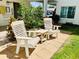 Inviting patio area with comfortable seating, perfect for enjoying the outdoors in a relaxed setting at 3320 Gulf Of Mexico Dr # 307C, Longboat Key, FL 34228