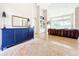 Bright and airy living room with wood floors, neutral walls, stylish furnishings, and lots of natural light at 3362 Charles Macdonald Dr, Sarasota, FL 34240