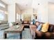 Open living room with vaulted ceiling, and views to the dining room at 3362 Charles Macdonald Dr, Sarasota, FL 34240