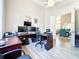 Well-lit home office with a desk and ample workspace at 3362 Charles Macdonald Dr, Sarasota, FL 34240