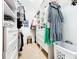 Spacious walk-in closet with custom shelves, drawers, and ample hanging storage, neatly organized at 3362 Charles Macdonald Dr, Sarasota, FL 34240