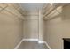 Walk-in closet featuring adjustable shelving for ample storage at 3666 Bonaventure Ct, Sarasota, FL 34243