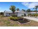 Charming single-story home featuring a well-maintained lawn, mature landscaping, and an attached two-car garage at 3666 Bonaventure Ct, Sarasota, FL 34243