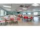Spacious community room with tables and chairs, perfect for gatherings and events at 3740 Lake Bayshore Dr # 501, Bradenton, FL 34205