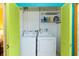 Convenient laundry room with side-by-side washer and dryer at 3740 Lake Bayshore Dr # 501, Bradenton, FL 34205