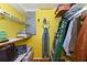 Walk-in closet with shelves and rods, offering ample storage space at 3740 Lake Bayshore Dr # 501, Bradenton, FL 34205
