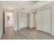 Bright bedroom with wood floors, a ceiling fan, closet and access to ensuite bathroom at 383 Bobby Jones Rd # 383, Sarasota, FL 34232