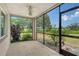 Enjoy scenic views from this lovely screened patio with ceiling fan and nature scenery at 383 Bobby Jones Rd # 383, Sarasota, FL 34232