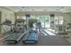 Bright fitness center equipped with modern treadmills and exercise machines, offering a premier workout experience for residents at 385 N Point Rd # 503, Osprey, FL 34229