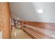 Spacious attic area for storage with patterned floors, storage shelves and access to duct work at 3936 Spyglass Hill Rd, Sarasota, FL 34238