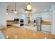Spacious kitchen with granite countertops, white cabinets, and stainless steel appliances at 3936 Spyglass Hill Rd, Sarasota, FL 34238