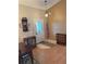 Inviting entryway features tile flooring, a decorative front door and an accent clock at 40 Mariner Ln, Rotonda West, FL 33947