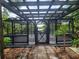 Tranquil backyard pergola featuring a beautiful water view at 4210 Baird St, Sarasota, FL 34232