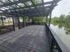Scenic backyard pergola featuring a beautiful lake view at 4210 Baird St, Sarasota, FL 34232