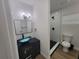 Bathroom featuring a vessel sink and walk-in shower at 4210 Baird St, Sarasota, FL 34232
