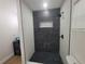 Modern bathroom featuring a glass shower with black hardware and a vessel sink at 4210 Baird St, Sarasota, FL 34232